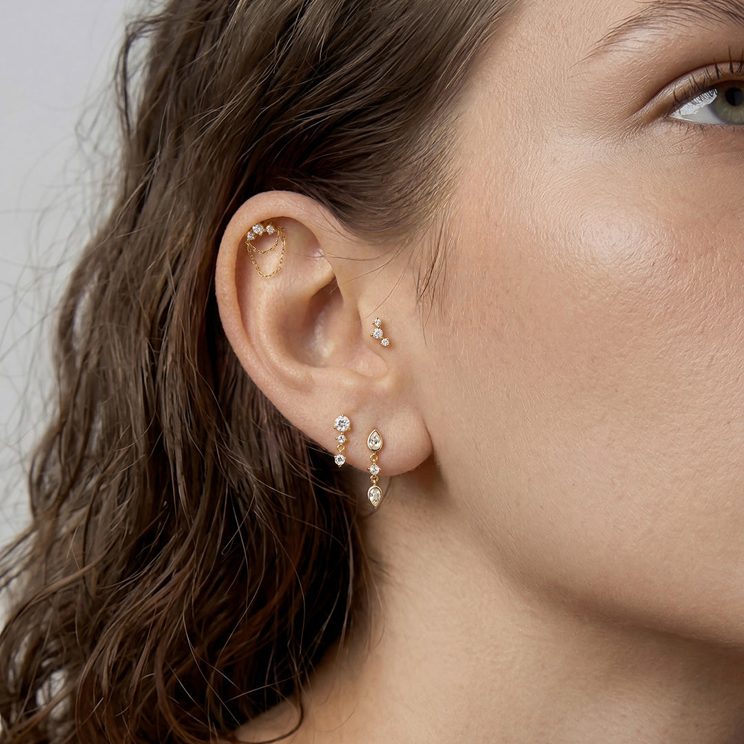 Elara Radiance shown within a layered diamond ear stack