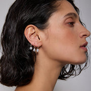 Eira Glimmer — huggie earrings, view 9