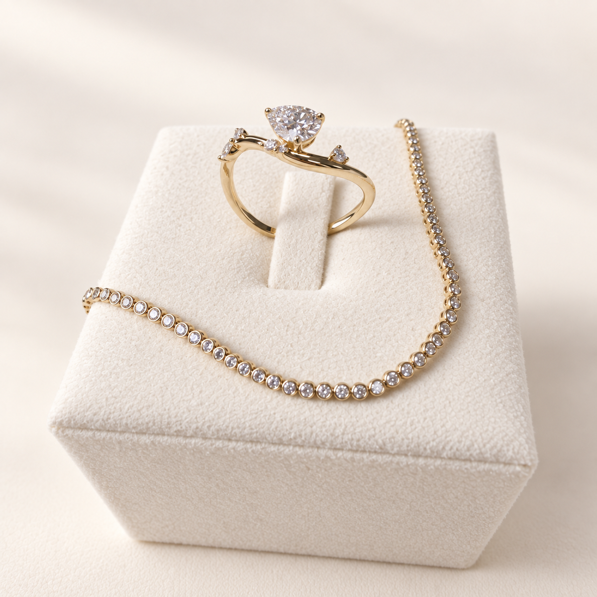 Arden Flame ring styled with the Sola Promise bracelet on ivory; bracelet sold separately