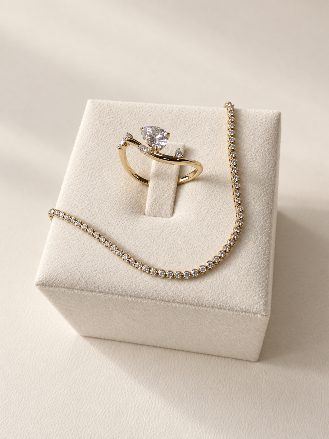 Sola Promise bezel-set diamond bracelet with Arden Flame ring on an ivory display — pieces sold separately