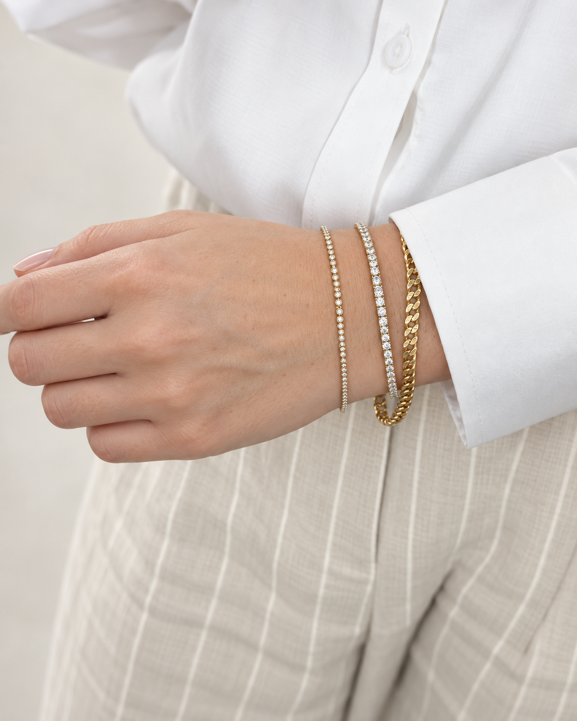 Sola Promise styled on the wrist with two other bracelets — pieces sold separately