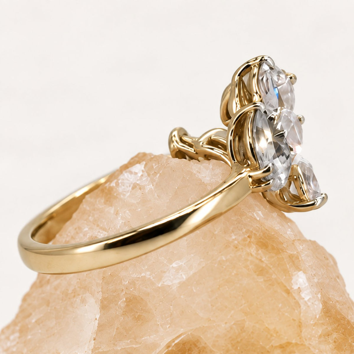 Laurel diamond leaf ring — side close-up on natural crystal