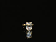 Isolde’s Secret elongated old-mine cushion laboratory-grown diamond ring, front view on polished black Perspex