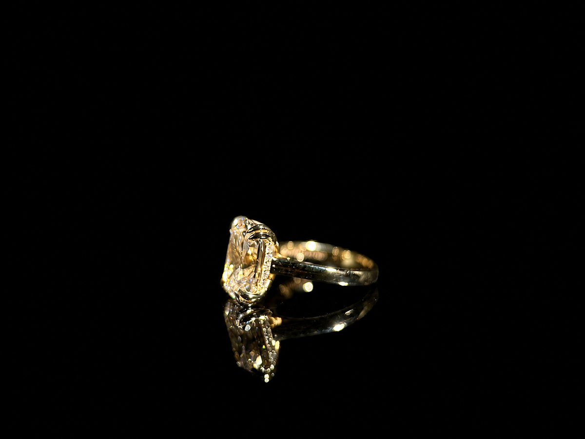 Isolde’s Secret ring, left profile showing the hidden halo and polished black reflection