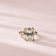 Isolde’s Secret elongated old-mine cushion lab-grown diamond ring, centred front view on pale blush cotton paper