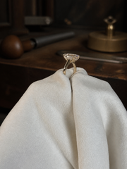 Isolde’s Secret ring on white jeweller’s linen, gallery and hidden halo view