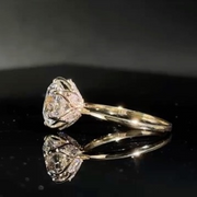 Olivia's Ovation lab-grown diamond ring from the rear, showing its sculptural marquise-set gallery and reflection