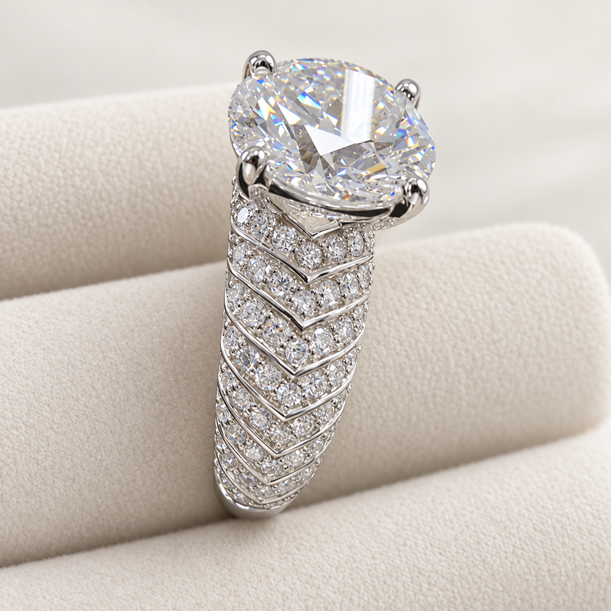 Plume — close view of the feather-like pavé shoulder and round centre