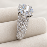 Plume — close view of the feather-like pavé shoulder and round centre
