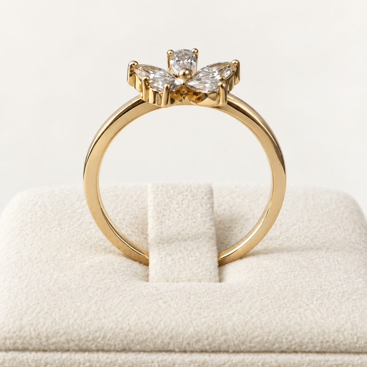 Posy — side profile showing the low floral setting and fine band