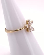 Posy — close studio rotation showing the five-petal flower and fine gold band
