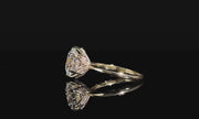 Olivia's Ovation lab-grown diamond ring rotating on polished black Perspex with its reflection