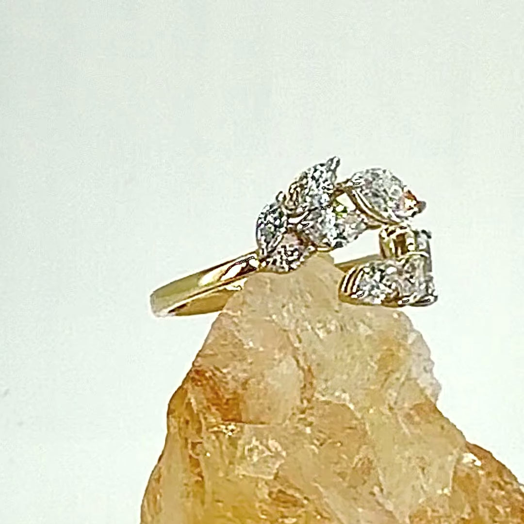 Laurel diamond leaf ring — close-up on a natural crystal