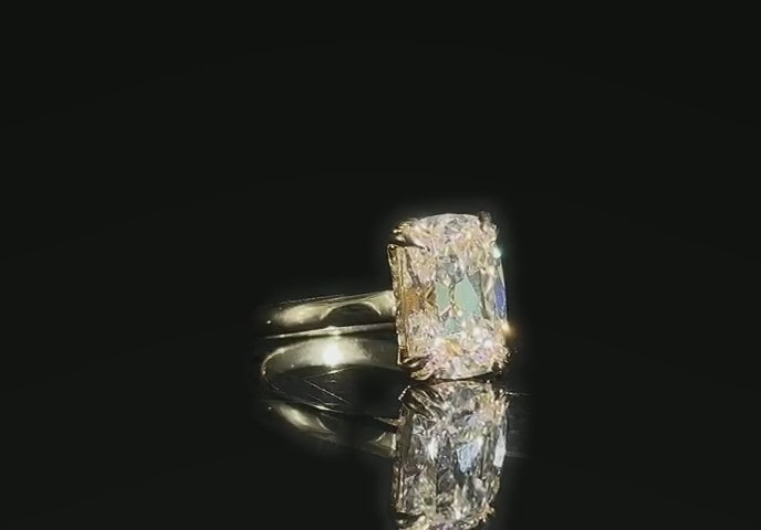 Isolde’s Secret elongated old-mine cushion laboratory-grown diamond ring rotating immediately on polished black Perspex with a continuous reflection