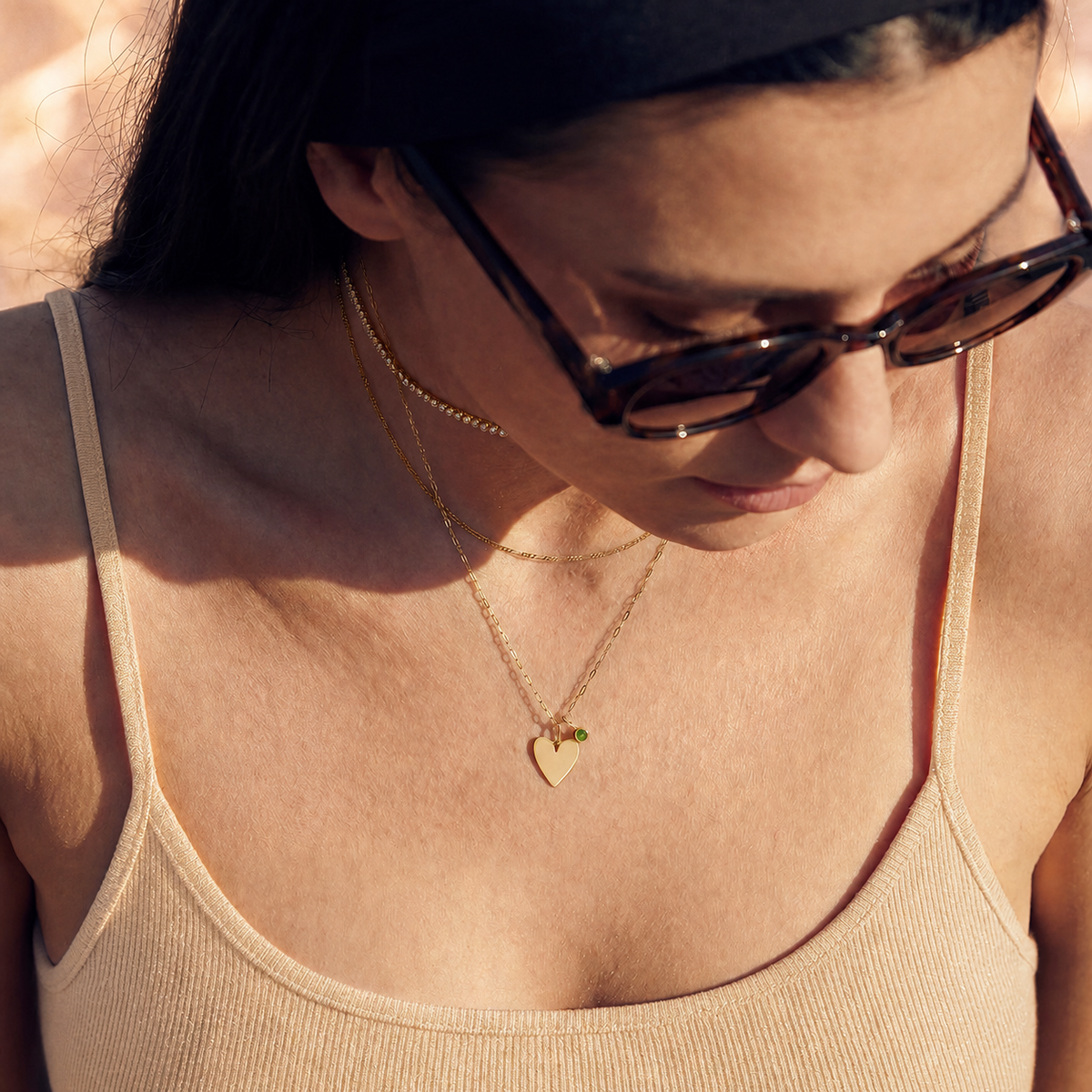 Roselle Still necklace styled with pale honey clothing