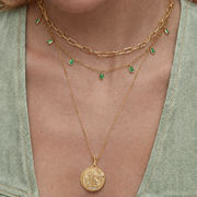 Seren Vow green stone necklace styled with pale sage clothing