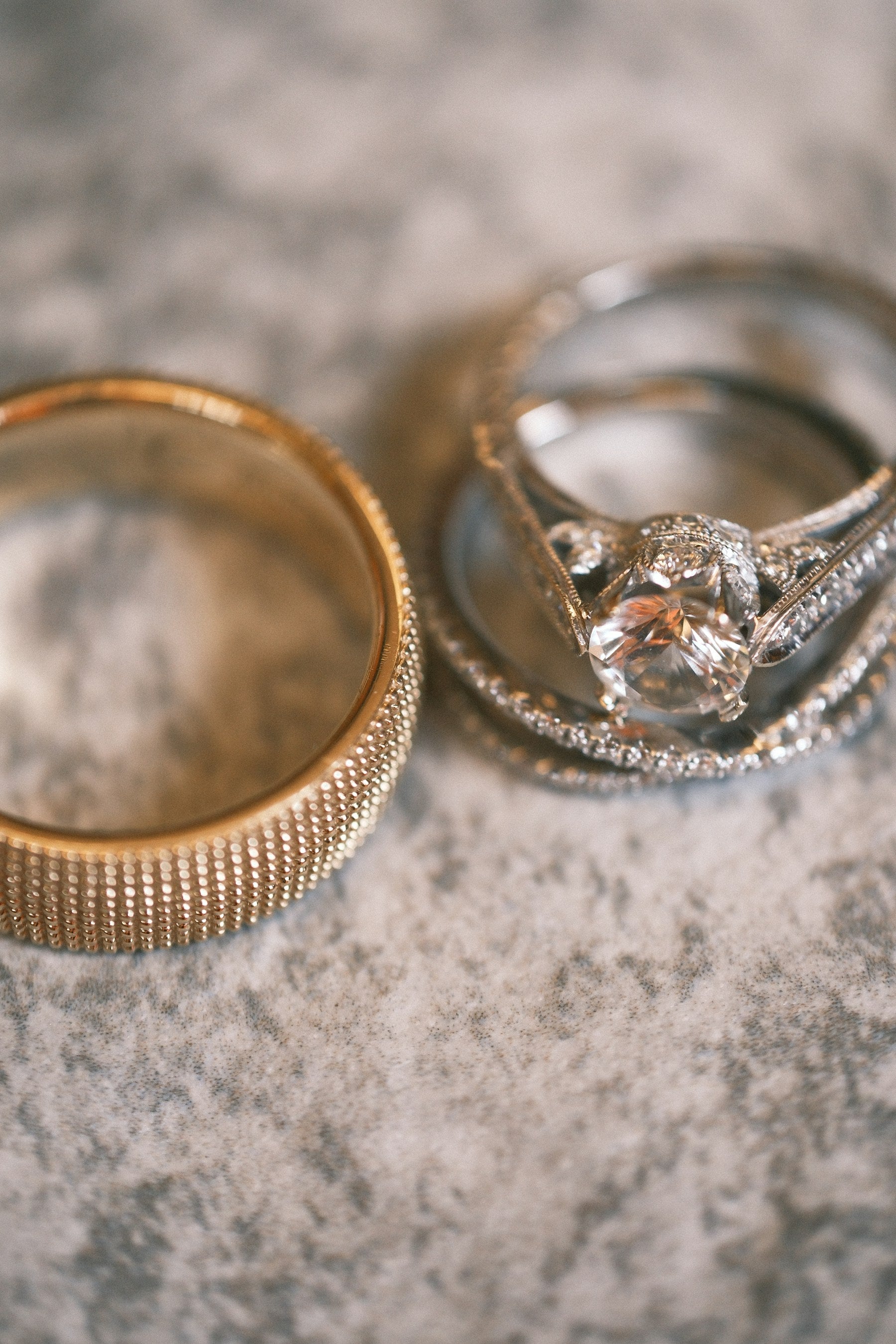 Wedding and engagement rings arranged together