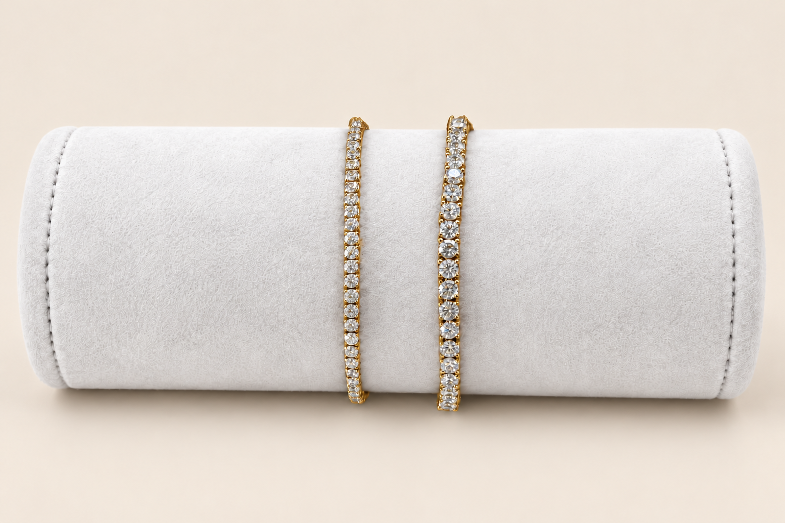 Eira Current diamond tennis bracelets on a white suede display